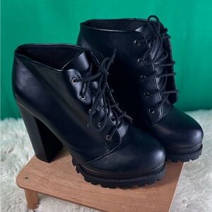 Chic Black Lace-Up Heeled Boots